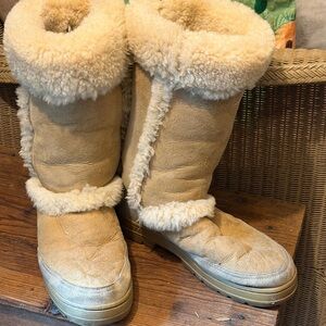UGG Sunburst Tall boots in a tan/sand suede with shearling lining.